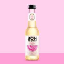 Bottle of Bon Accord Cream Soda against bright pink backdrop